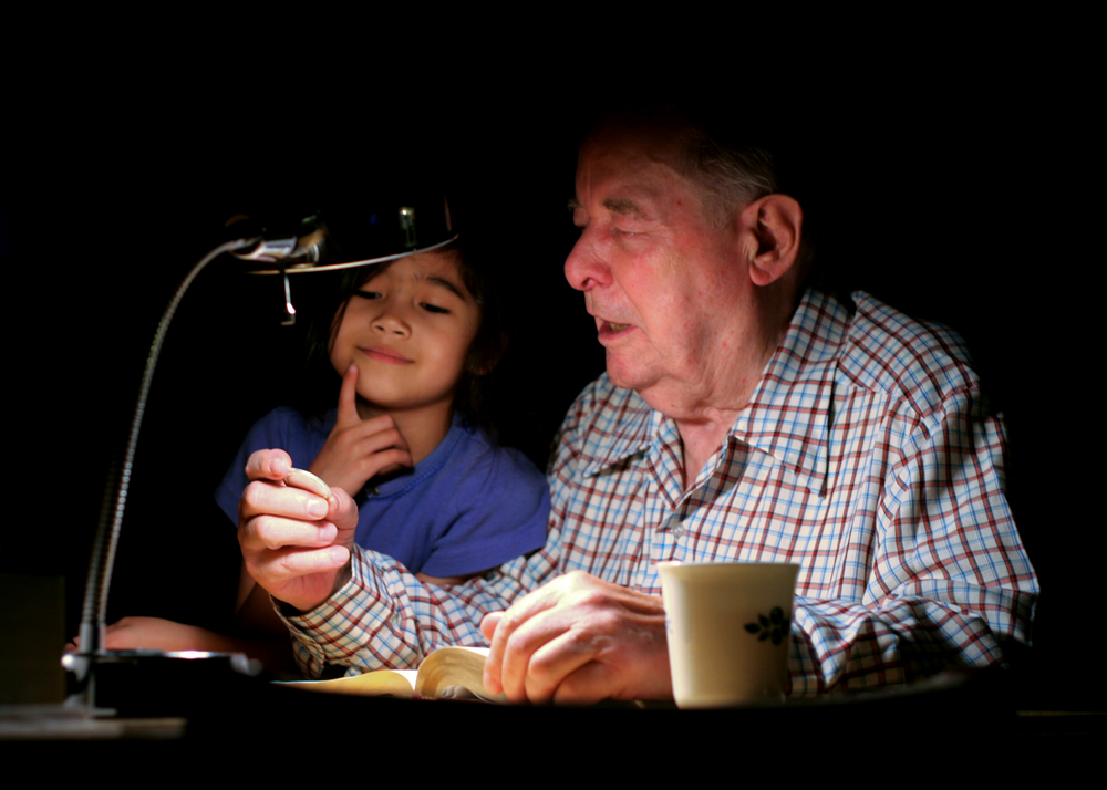 elderly couple concerned about retirement looking at paperwork
