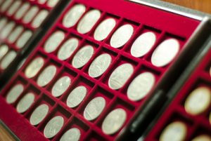 Collection of old coins in red case